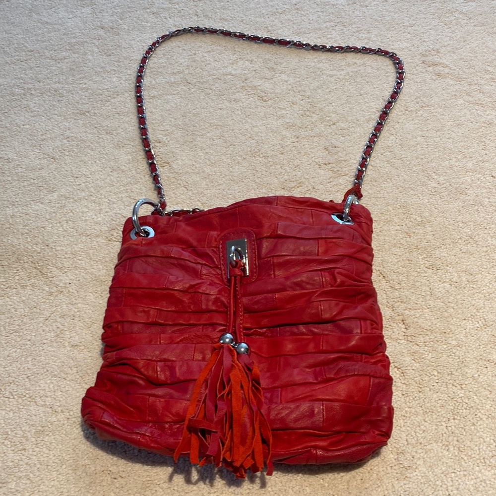 Fun red bag with silver chain, tassels and silver hardware